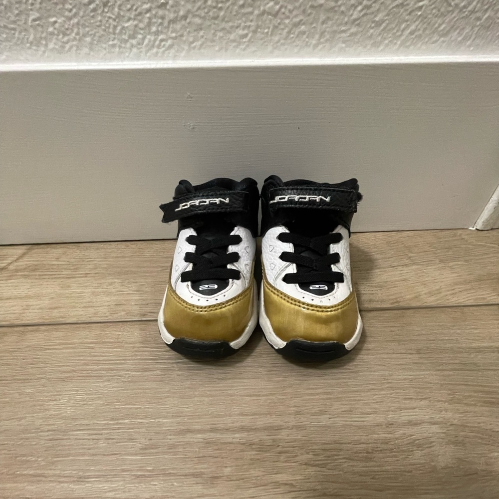 Jordan Kids Sneakers in Black, White, and Gold